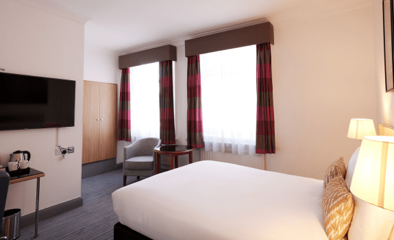 Standard Double Bedroom with double bed, chair and TV