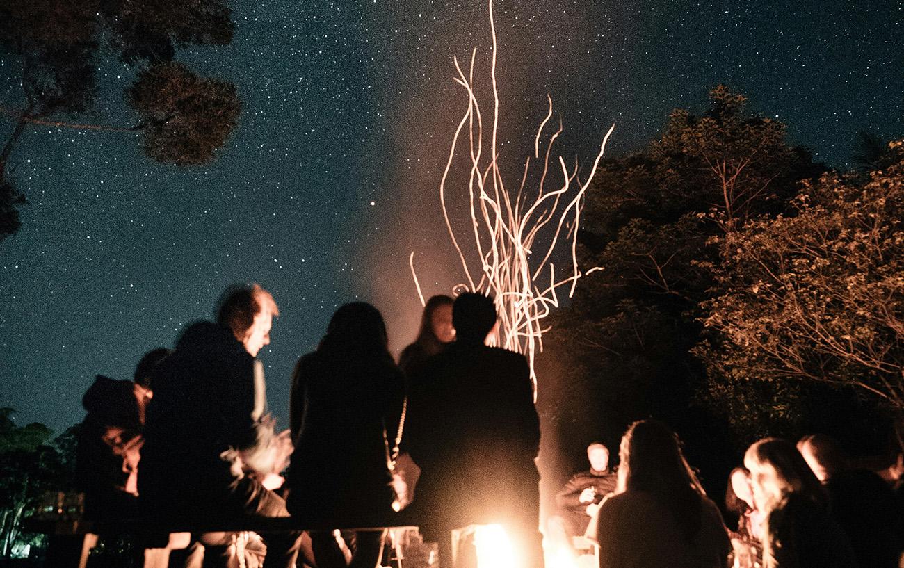 Group of people round a bonfire
