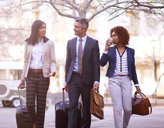 Colleagues-walking-and-discussing-business
