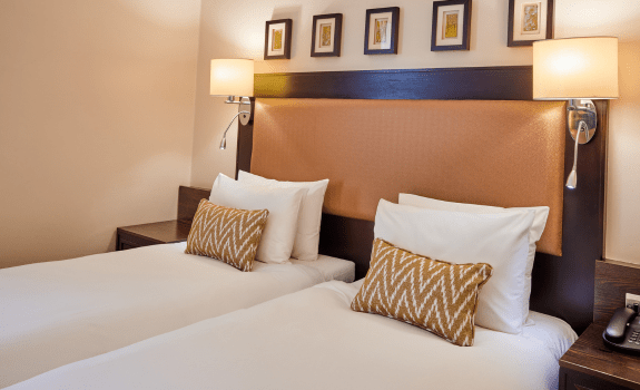 Heathrow Deluxe twin room close up of bed