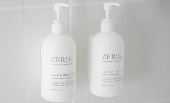 Shampoo and conditioner bottles in bathroom