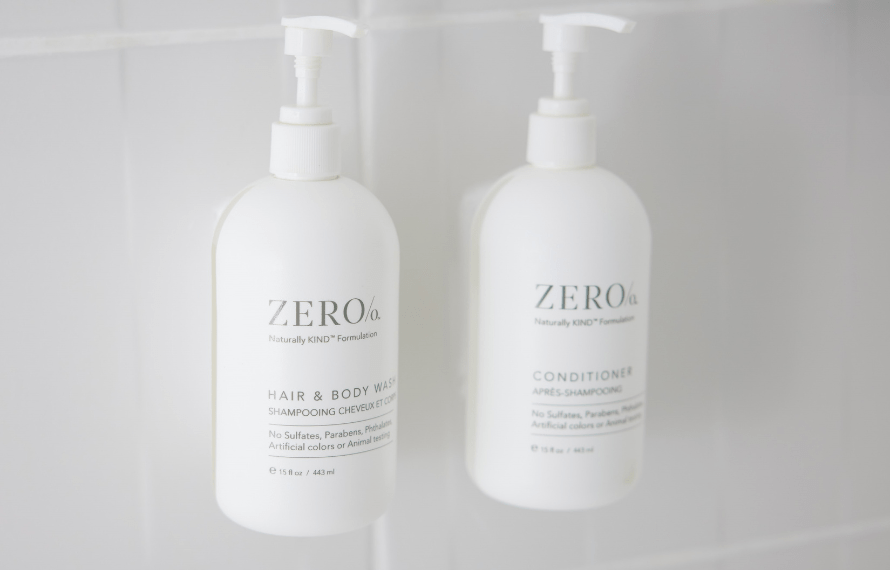 Shampoo and conditioner bottles in bathroom