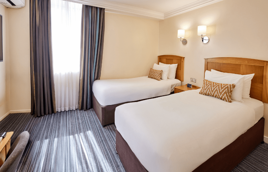 Twin beds in twin room at Thistle Heathrow