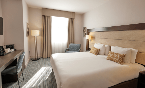 King bed in deluxe king bedroom