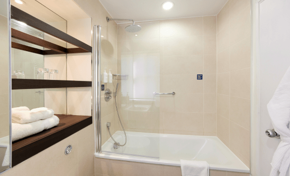 Bathroom with bathtub in executive room