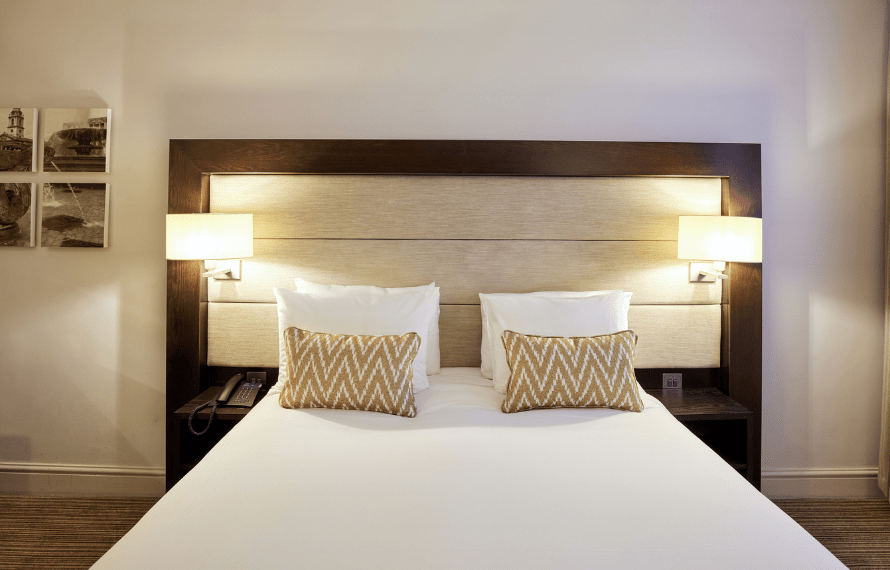 Close up of double bed with pillows