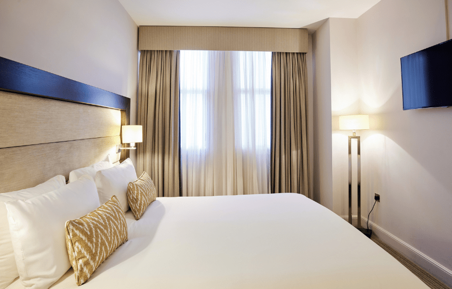 Double bed, window and TV
