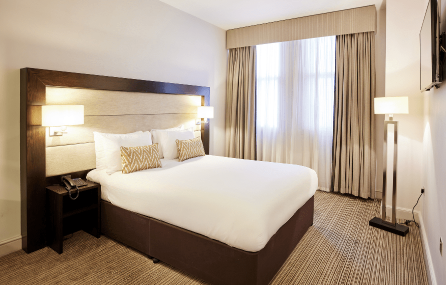 Double bed in double bedroom at Thistle Holborn