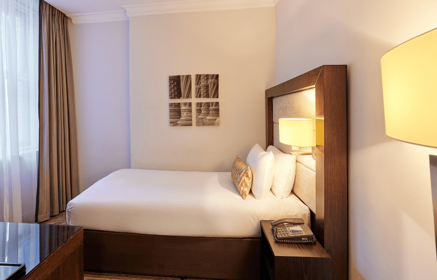 Single bed and art on the wall