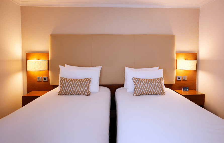 Close up of twin beds in deluxe twin room