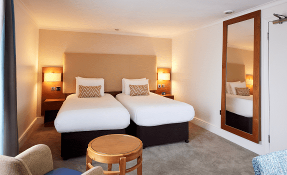 Twin beds in deluxe twin room