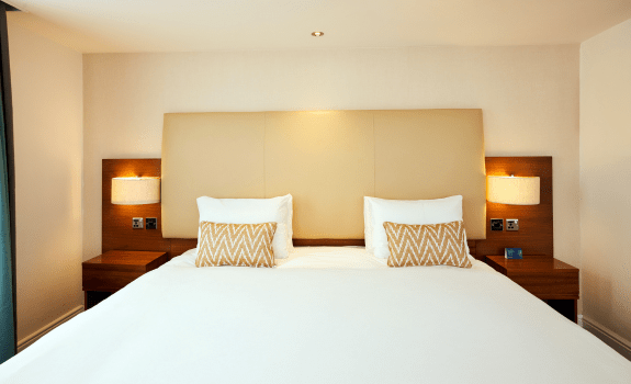 Close up of king bed in executive king room