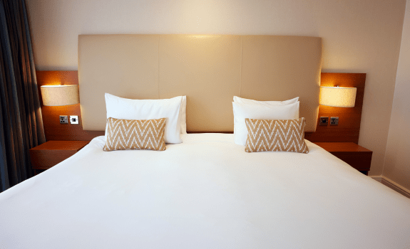 Close up of bed in junior suite