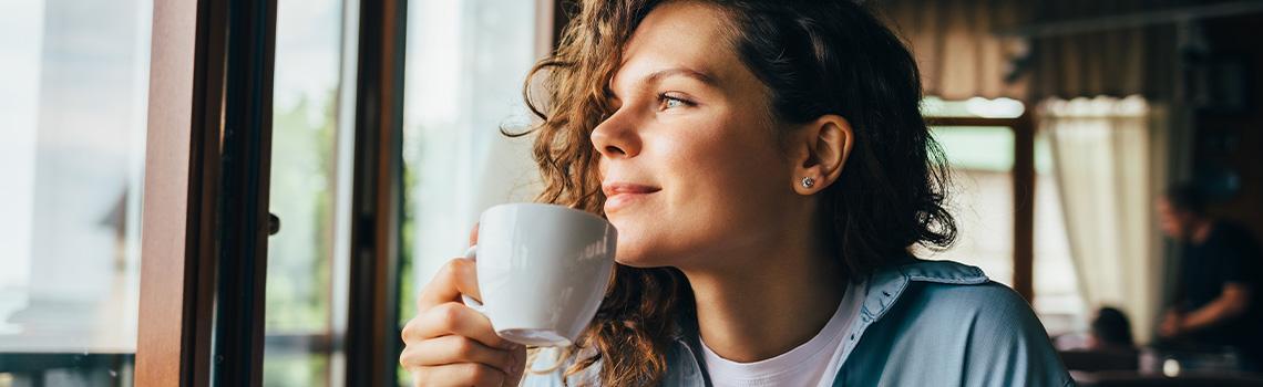 Offer-members-get-more-woman-drinking-coffee-header