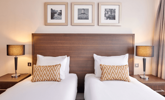 Close up of twin beds in twin room at Trafalgar square