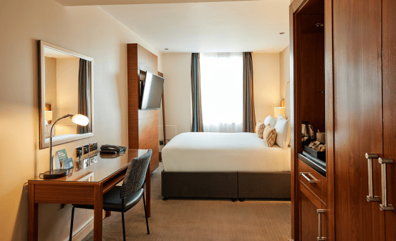 double bedroom with double bed and desk