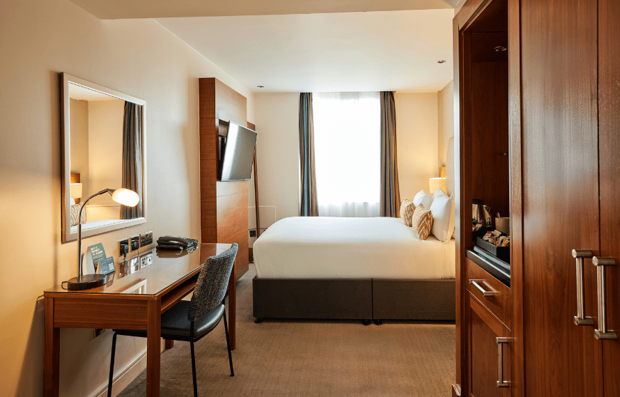 double bedroom with double bed and desk