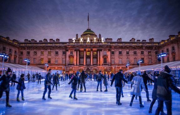 Ice rink with people ice-skating