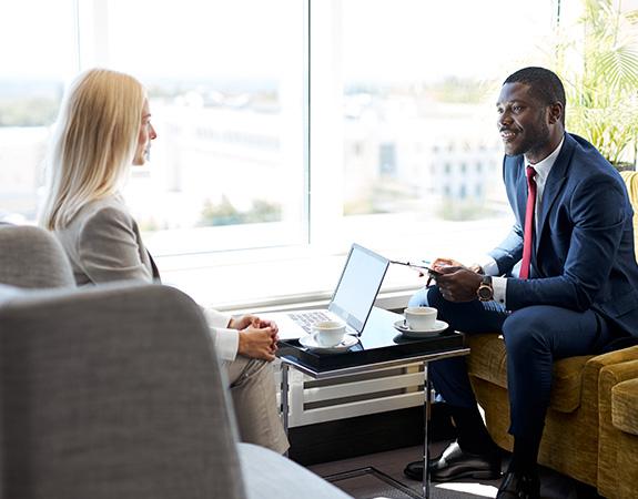 Colleagues discussing business