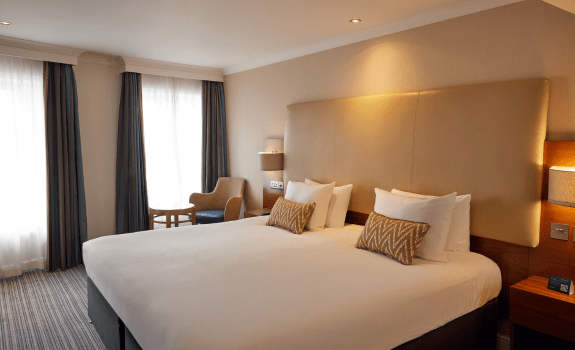 King bed in deluxe king bedroom