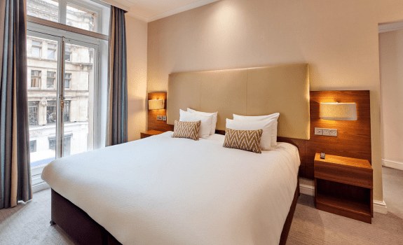 Bed in junior suite room