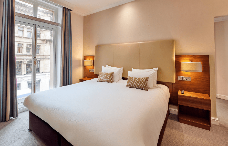 Bed in junior suite room