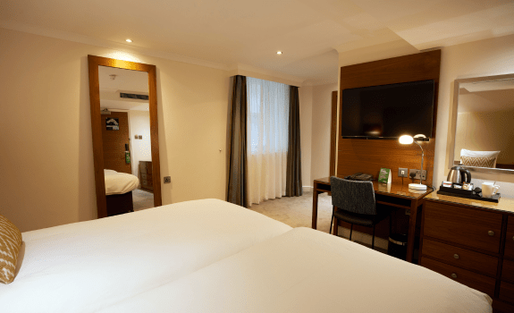 twin beds and desk