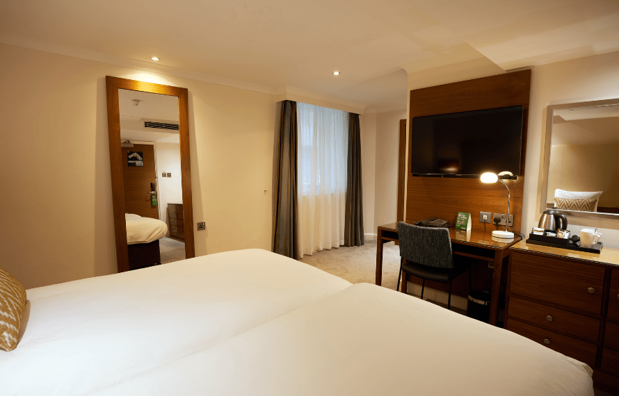 twin beds and desk