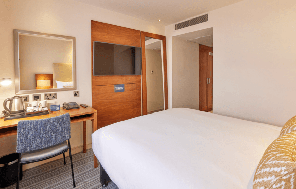 View of the double room space from the headboard